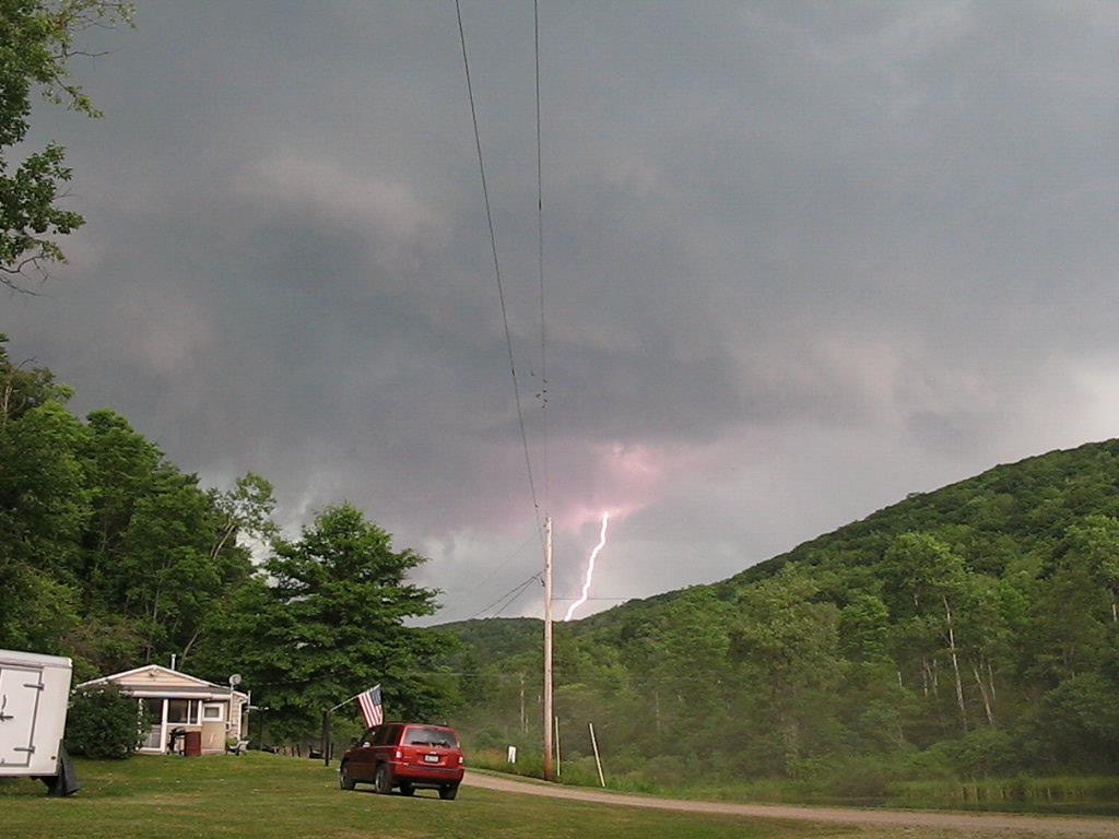 Here is a photo picture of a lightning bolt coming down on a mountain in Potter County.